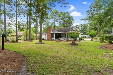 This delightful residence seamlessly blends style and comfort on Carolina Shores Golf Course in North Carolina - for sale on GolfHomes.com, golf home, golf lot