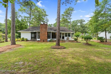 This delightful residence seamlessly blends style and comfort on Carolina Shores Golf Course in North Carolina - for sale on GolfHomes.com, golf home, golf lot