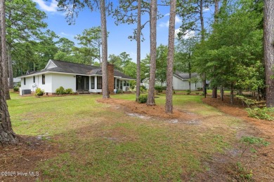 This delightful residence seamlessly blends style and comfort on Carolina Shores Golf Course in North Carolina - for sale on GolfHomes.com, golf home, golf lot