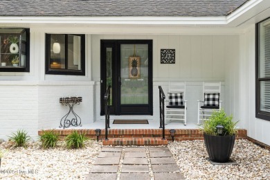 This delightful residence seamlessly blends style and comfort on Carolina Shores Golf Course in North Carolina - for sale on GolfHomes.com, golf home, golf lot