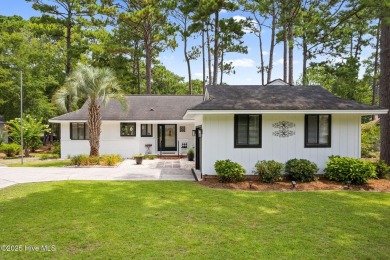 This delightful residence seamlessly blends style and comfort on Carolina Shores Golf Course in North Carolina - for sale on GolfHomes.com, golf home, golf lot