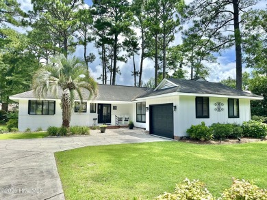 This delightful residence seamlessly blends style and comfort on Carolina Shores Golf Course in North Carolina - for sale on GolfHomes.com, golf home, golf lot