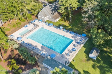This delightful residence seamlessly blends style and comfort on Carolina Shores Golf Course in North Carolina - for sale on GolfHomes.com, golf home, golf lot
