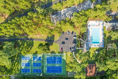 This delightful residence seamlessly blends style and comfort on Carolina Shores Golf Course in North Carolina - for sale on GolfHomes.com, golf home, golf lot