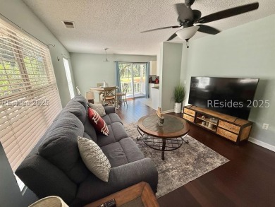 Beautiful first-floor villa featuring a private deck with serene on Old South Golf Links in South Carolina - for sale on GolfHomes.com, golf home, golf lot