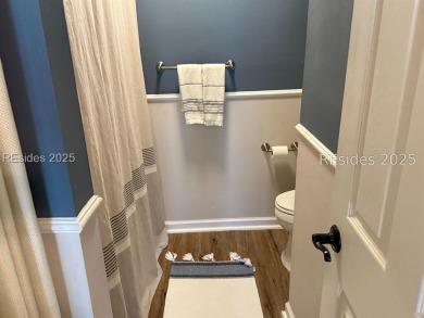 Beautiful first-floor villa featuring a private deck with serene on Old South Golf Links in South Carolina - for sale on GolfHomes.com, golf home, golf lot
