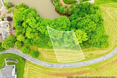 An incredible opportunity to own a prime 0.4-acre lakefront lot on Rarity Bay Country Club - Loudon in Tennessee - for sale on GolfHomes.com, golf home, golf lot