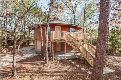 Calling all nature lovers!  Versatile two story Topsider home on Diamondhead Country Club in Mississippi - for sale on GolfHomes.com, golf home, golf lot