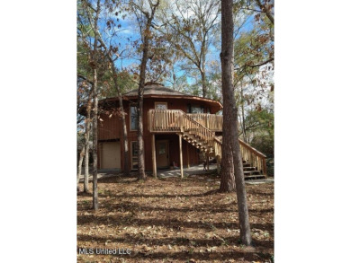 Calling all nature lovers!  Versatile two story Topsider home on Diamondhead Country Club in Mississippi - for sale on GolfHomes.com, golf home, golf lot