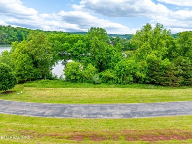 An incredible opportunity to own a prime 0.4-acre lakefront lot on Rarity Bay Country Club - Loudon in Tennessee - for sale on GolfHomes.com, golf home, golf lot