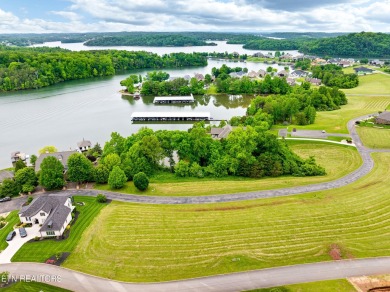 An incredible opportunity to own a prime 0.4-acre lakefront lot on Rarity Bay Country Club - Loudon in Tennessee - for sale on GolfHomes.com, golf home, golf lot