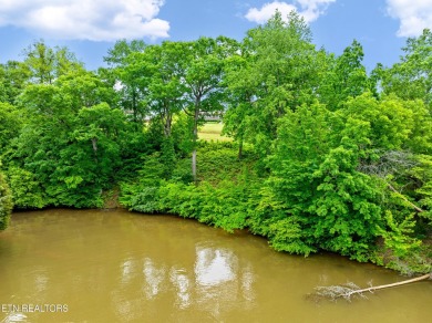 An incredible opportunity to own a prime 0.4-acre lakefront lot on Rarity Bay Country Club - Loudon in Tennessee - for sale on GolfHomes.com, golf home, golf lot