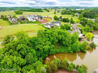 An incredible opportunity to own a prime 0.4-acre lakefront lot on Rarity Bay Country Club - Loudon in Tennessee - for sale on GolfHomes.com, golf home, golf lot