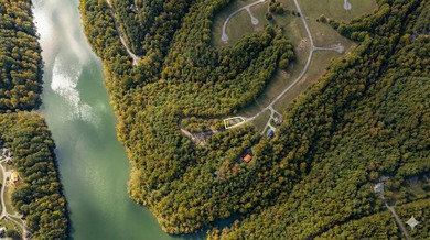 Beautiful 0.5-acre wooded building lot located in the gated on Links At Lily Creek Resort in Kentucky - for sale on GolfHomes.com, golf home, golf lot