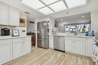 Beautifully maintained townhouse ideally situated on Meadow #1 on Carrollwood Country Club in Florida - for sale on GolfHomes.com, golf home, golf lot