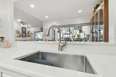 Beautifully maintained townhouse ideally situated on Meadow #1 on Carrollwood Country Club in Florida - for sale on GolfHomes.com, golf home, golf lot