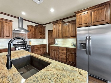 Custom-built and perfectly positioned on Hole #6 of the renowned on Rayburn Country Club in Texas - for sale on GolfHomes.com, golf home, golf lot