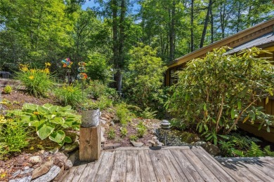 Nestled at the end of a quiet cul-de-sac in The Woods, this on The Country Club of Sapphire Valley in North Carolina - for sale on GolfHomes.com, golf home, golf lot