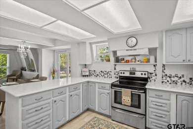 Nestled in the heart of Hideaway, Texas, this charming A-frame on Hide-A-Way Lake Golf Course in Texas - for sale on GolfHomes.com, golf home, golf lot