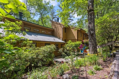 Nestled at the end of a quiet cul-de-sac in The Woods, this on The Country Club of Sapphire Valley in North Carolina - for sale on GolfHomes.com, golf home, golf lot
