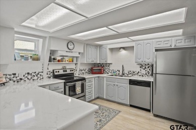 Nestled in the heart of Hideaway, Texas, this charming A-frame on Hide-A-Way Lake Golf Course in Texas - for sale on GolfHomes.com, golf home, golf lot