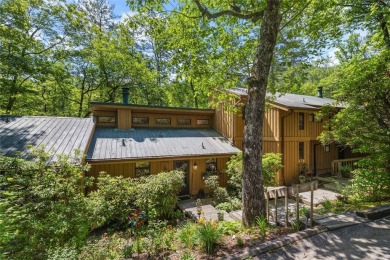 Nestled at the end of a quiet cul-de-sac in The Woods, this on The Country Club of Sapphire Valley in North Carolina - for sale on GolfHomes.com, golf home, golf lot
