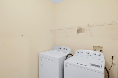 Beautifully Remodeled 3-Bedroom, 2-Bath First-Floor Condo in New on Heritage Isles Golf and Country Club in Florida - for sale on GolfHomes.com, golf home, golf lot