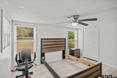 Nestled in the heart of Hideaway, Texas, this charming A-frame on Hide-A-Way Lake Golf Course in Texas - for sale on GolfHomes.com, golf home, golf lot