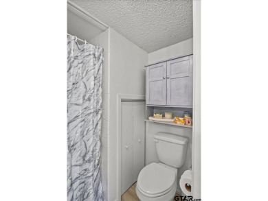 Nestled in the heart of Hideaway, Texas, this charming A-frame on Hide-A-Way Lake Golf Course in Texas - for sale on GolfHomes.com, golf home, golf lot