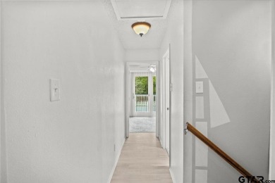 Nestled in the heart of Hideaway, Texas, this charming A-frame on Hide-A-Way Lake Golf Course in Texas - for sale on GolfHomes.com, golf home, golf lot
