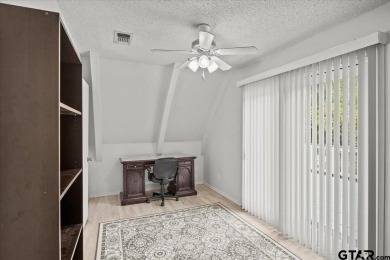 Nestled in the heart of Hideaway, Texas, this charming A-frame on Hide-A-Way Lake Golf Course in Texas - for sale on GolfHomes.com, golf home, golf lot