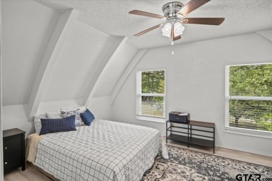 Nestled in the heart of Hideaway, Texas, this charming A-frame on Hide-A-Way Lake Golf Course in Texas - for sale on GolfHomes.com, golf home, golf lot
