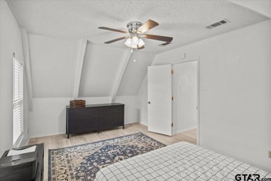 Nestled in the heart of Hideaway, Texas, this charming A-frame on Hide-A-Way Lake Golf Course in Texas - for sale on GolfHomes.com, golf home, golf lot