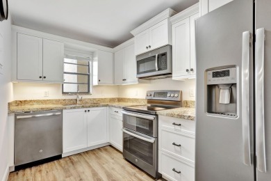 RARELY AVAILABLE 1200sf XTRA LARGE 2Bd 2Ba condo overlkg on Deer Creek Golf Club in Florida - for sale on GolfHomes.com, golf home, golf lot