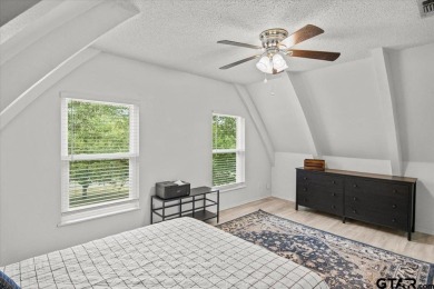 Nestled in the heart of Hideaway, Texas, this charming A-frame on Hide-A-Way Lake Golf Course in Texas - for sale on GolfHomes.com, golf home, golf lot