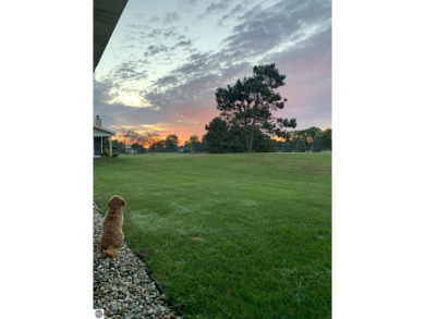 Enjoy carefree living in this Woodbridge Hills condo overlooking on The Moors Golf Club in Michigan - for sale on GolfHomes.com, golf home, golf lot