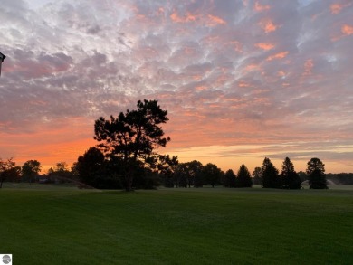 Enjoy carefree living in this Woodbridge Hills condo overlooking on The Moors Golf Club in Michigan - for sale on GolfHomes.com, golf home, golf lot