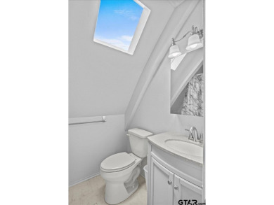 Nestled in the heart of Hideaway, Texas, this charming A-frame on Hide-A-Way Lake Golf Course in Texas - for sale on GolfHomes.com, golf home, golf lot