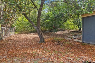 Nestled in the heart of Hideaway, Texas, this charming A-frame on Hide-A-Way Lake Golf Course in Texas - for sale on GolfHomes.com, golf home, golf lot