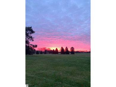 Enjoy carefree living in this Woodbridge Hills condo overlooking on The Moors Golf Club in Michigan - for sale on GolfHomes.com, golf home, golf lot