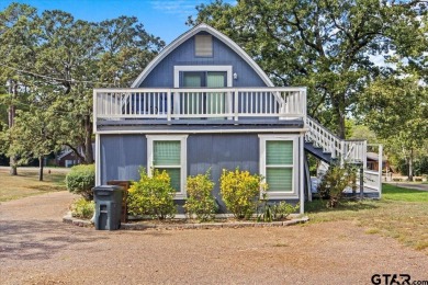 Nestled in the heart of Hideaway, Texas, this charming A-frame on Hide-A-Way Lake Golf Course in Texas - for sale on GolfHomes.com, golf home, golf lot