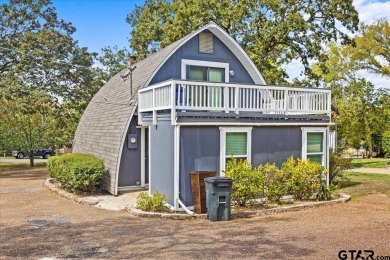 Nestled in the heart of Hideaway, Texas, this charming A-frame on Hide-A-Way Lake Golf Course in Texas - for sale on GolfHomes.com, golf home, golf lot