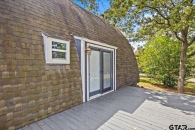Nestled in the heart of Hideaway, Texas, this charming A-frame on Hide-A-Way Lake Golf Course in Texas - for sale on GolfHomes.com, golf home, golf lot