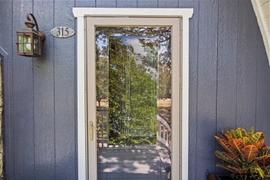 Nestled in the heart of Hideaway, Texas, this charming A-frame on Hide-A-Way Lake Golf Course in Texas - for sale on GolfHomes.com, golf home, golf lot