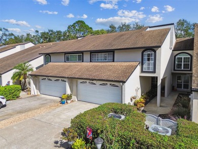 MOVE IN READY!! Beautifully maintained townhouse ideally on Carrollwood Country Club in Florida - for sale on GolfHomes.com, golf home, golf lot