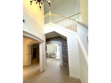 This unique residence offers a rare, oversized yard within the on Heritage Palms Golf and Country Club in Florida - for sale on GolfHomes.com, golf home, golf lot