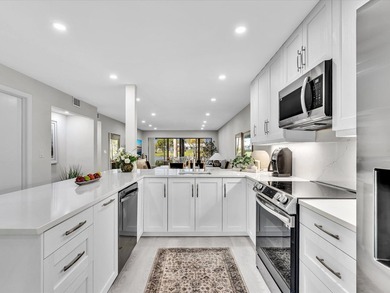 This move-in ready first floor open concept condo features a on Boca Delray Golf and Country Club in Florida - for sale on GolfHomes.com, golf home, golf lot