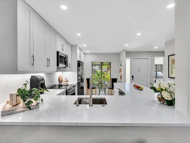 This move-in ready first floor open concept condo features a on Boca Delray Golf and Country Club in Florida - for sale on GolfHomes.com, golf home, golf lot