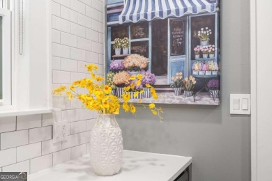 This 3-bedroom, 2-bath brick bungalow blends timeless character on College Park Municipal Golf Course in Georgia - for sale on GolfHomes.com, golf home, golf lot