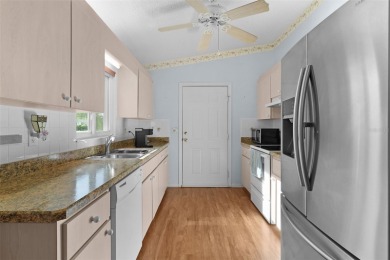 NEW ROOF 2022! Step into this charming 2 Bedroom, 2 Bath PECAN on The Links of Spruce Creek in Florida - for sale on GolfHomes.com, golf home, golf lot